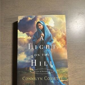A Light on the Hill by Connilyn Cossette